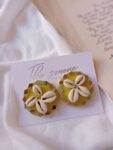 Rainvas Light Green kauri shells studs earrings